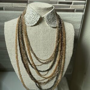 Multilayered mid length necklace